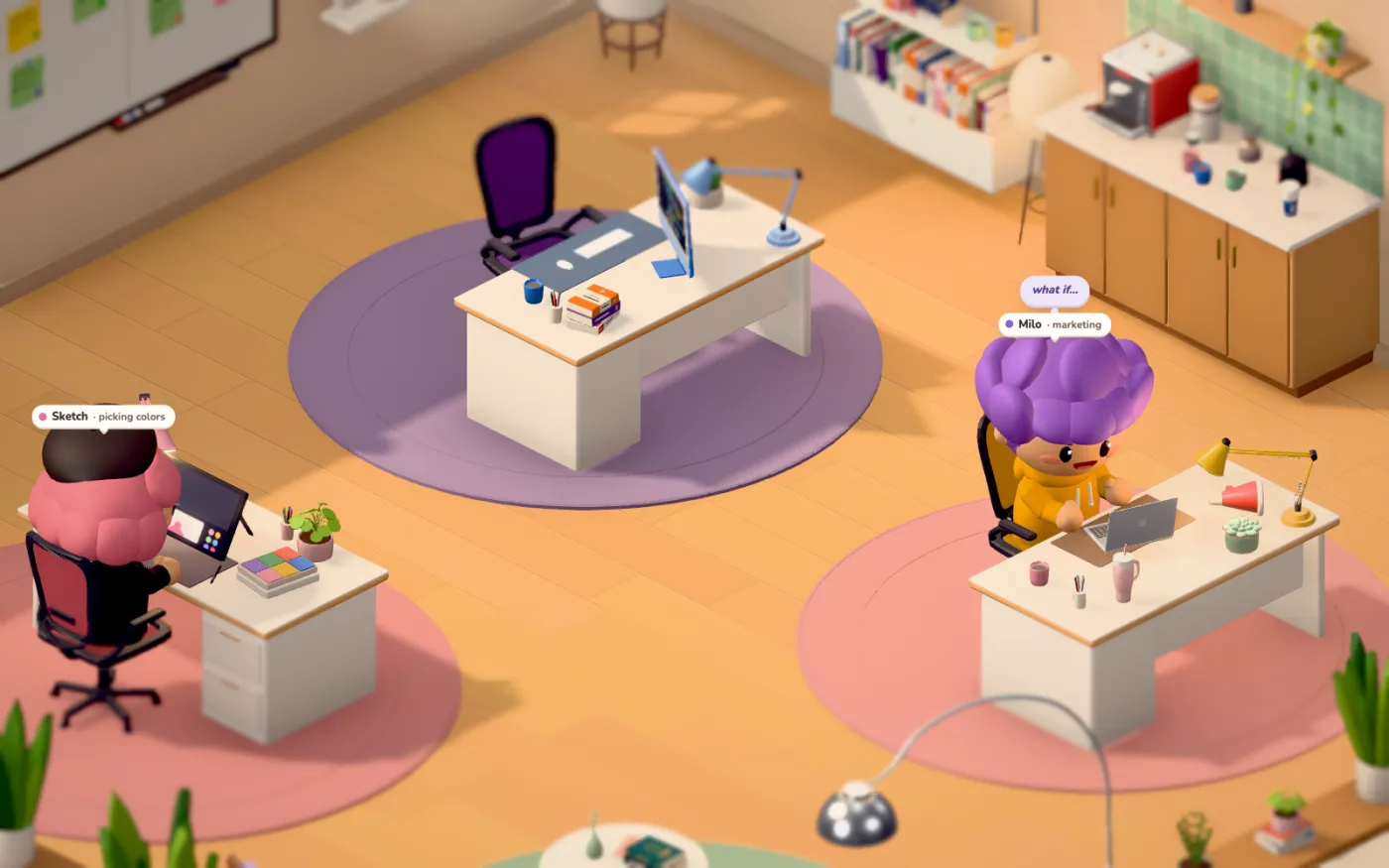 Three coworkers at their desks in the sunny office